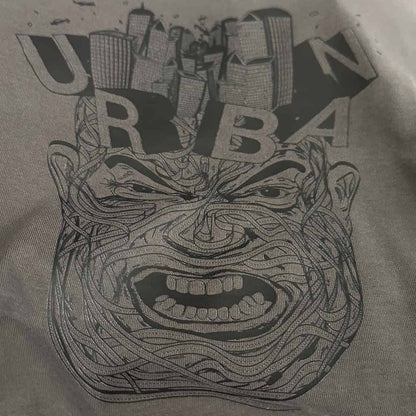 Defeua URBAN JUNGLE T-shirt antracite unisex dettaglio grafica illustrazione volto che rappresenta lo stress della giungla urbana